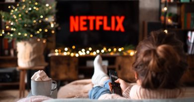 Capturing Childhood Magic: A Little Girl’s Delightful Evening on the Couch with Netflix