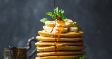 Sweet Delight: Drizzling honey over perfect pancakes